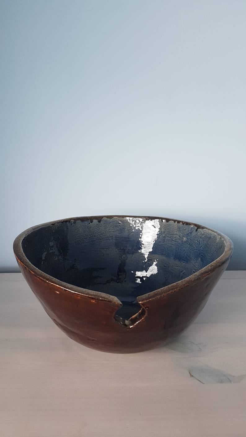 Chocolate brown and teal cut out bowl